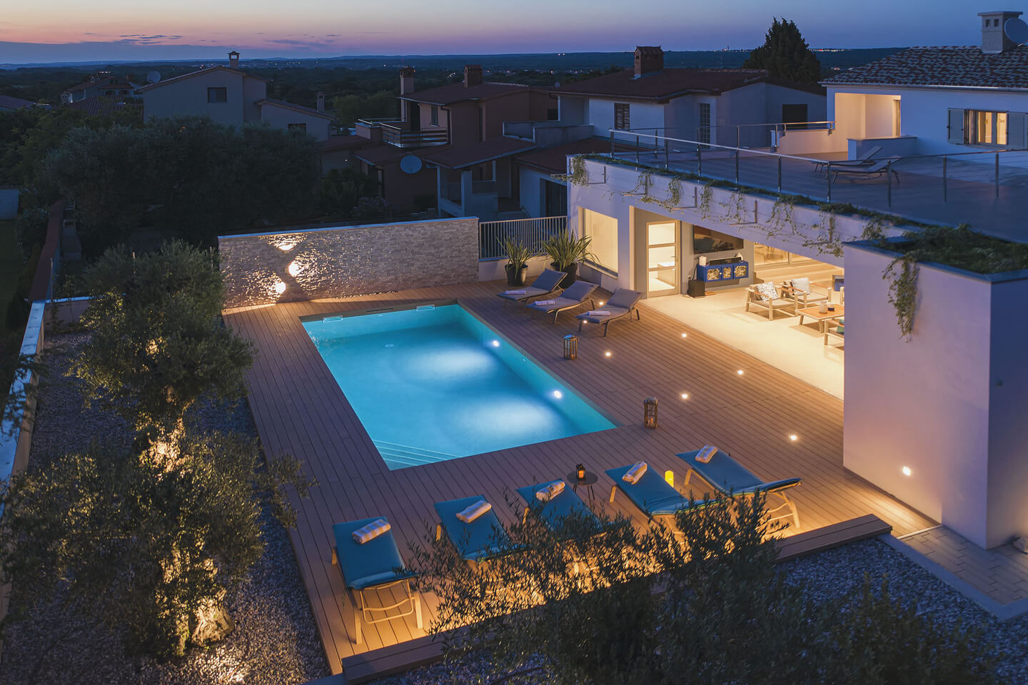 Atmospheric lighting around the terrace and pool