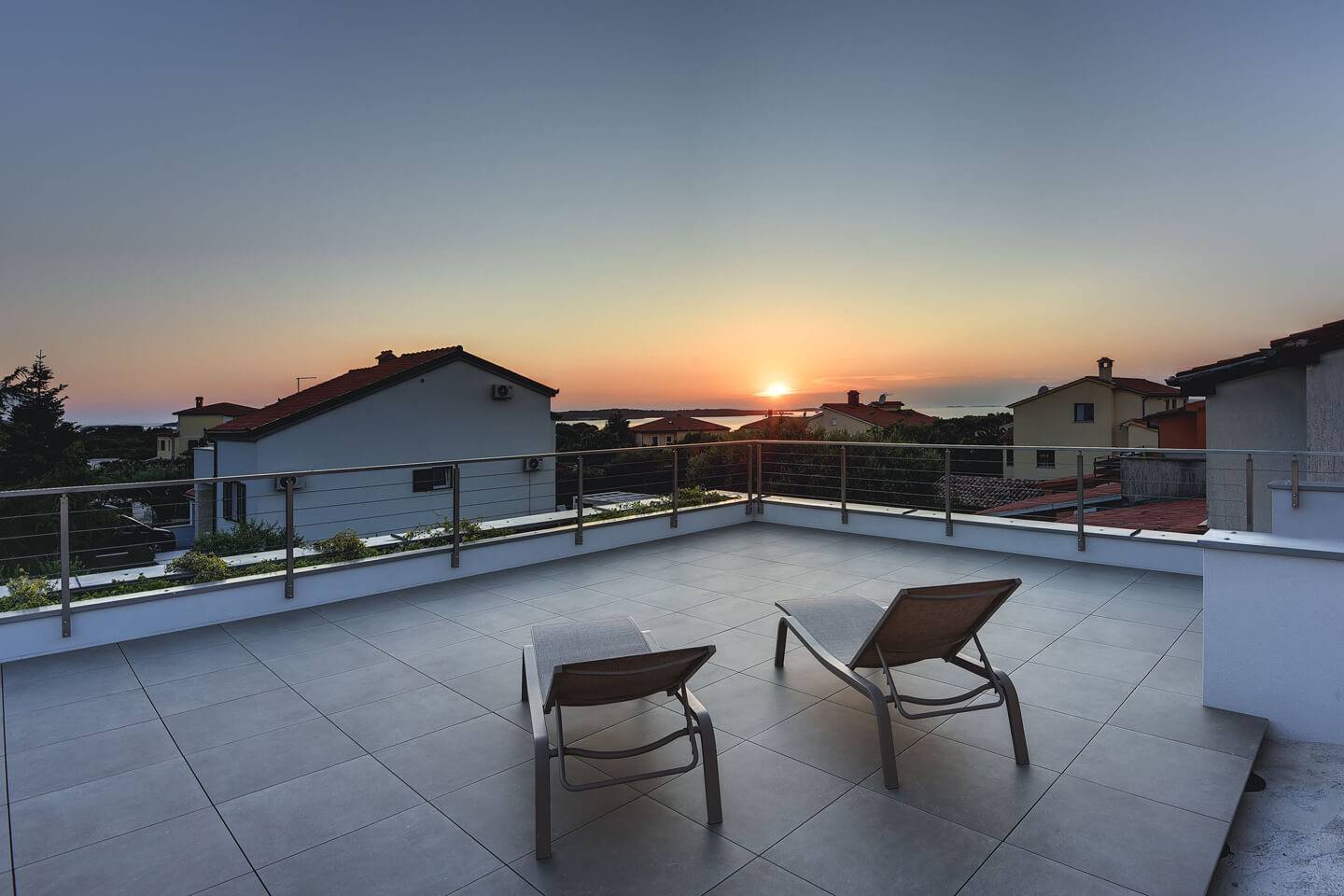 Roof terrace with beautiful ocean sunset view