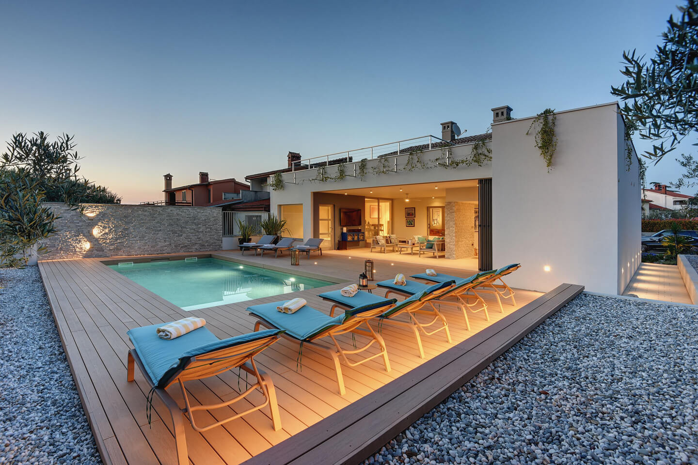 Sun terrace with sunloungers and private pool