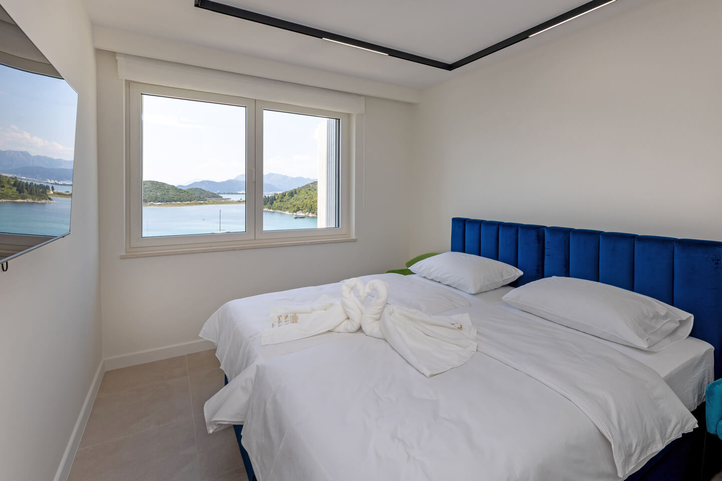 First floor bedroom 2 with TV