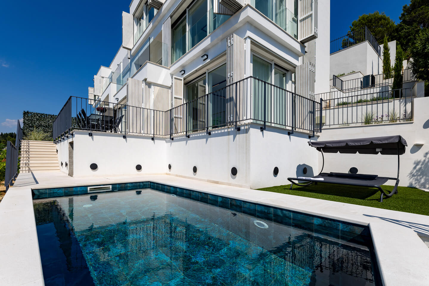 Ground floor pool and sunbathing area