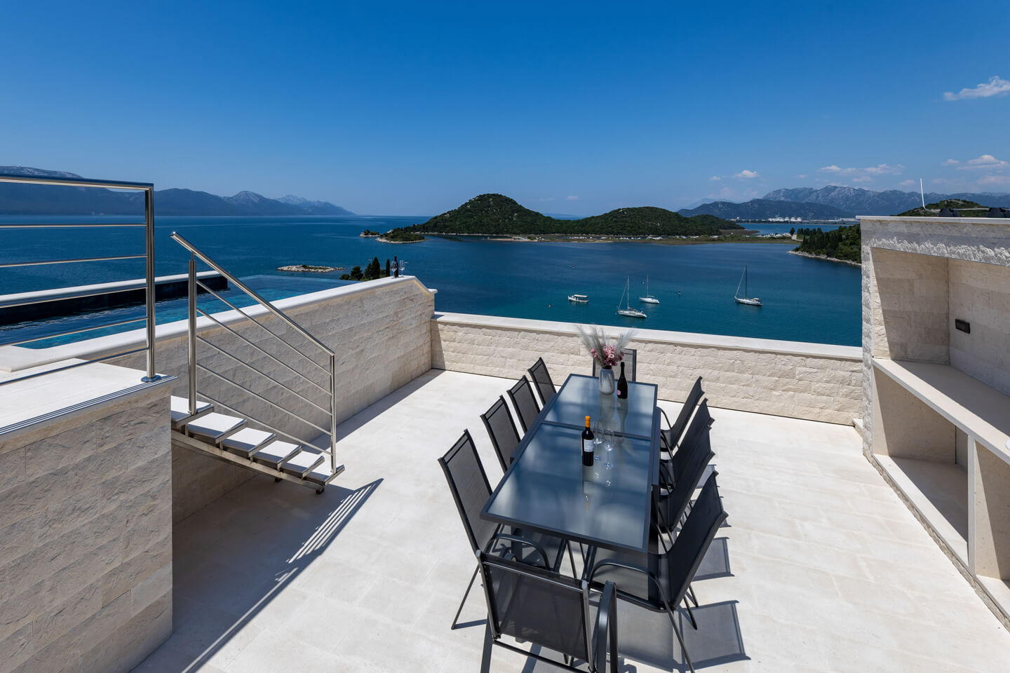Roof terrace dining with sea view