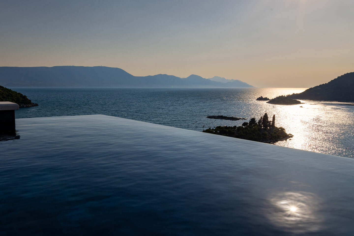Roof terrace pool view at dusk
