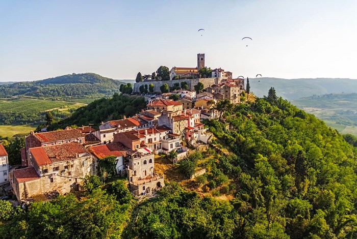 Motovun with paragliders